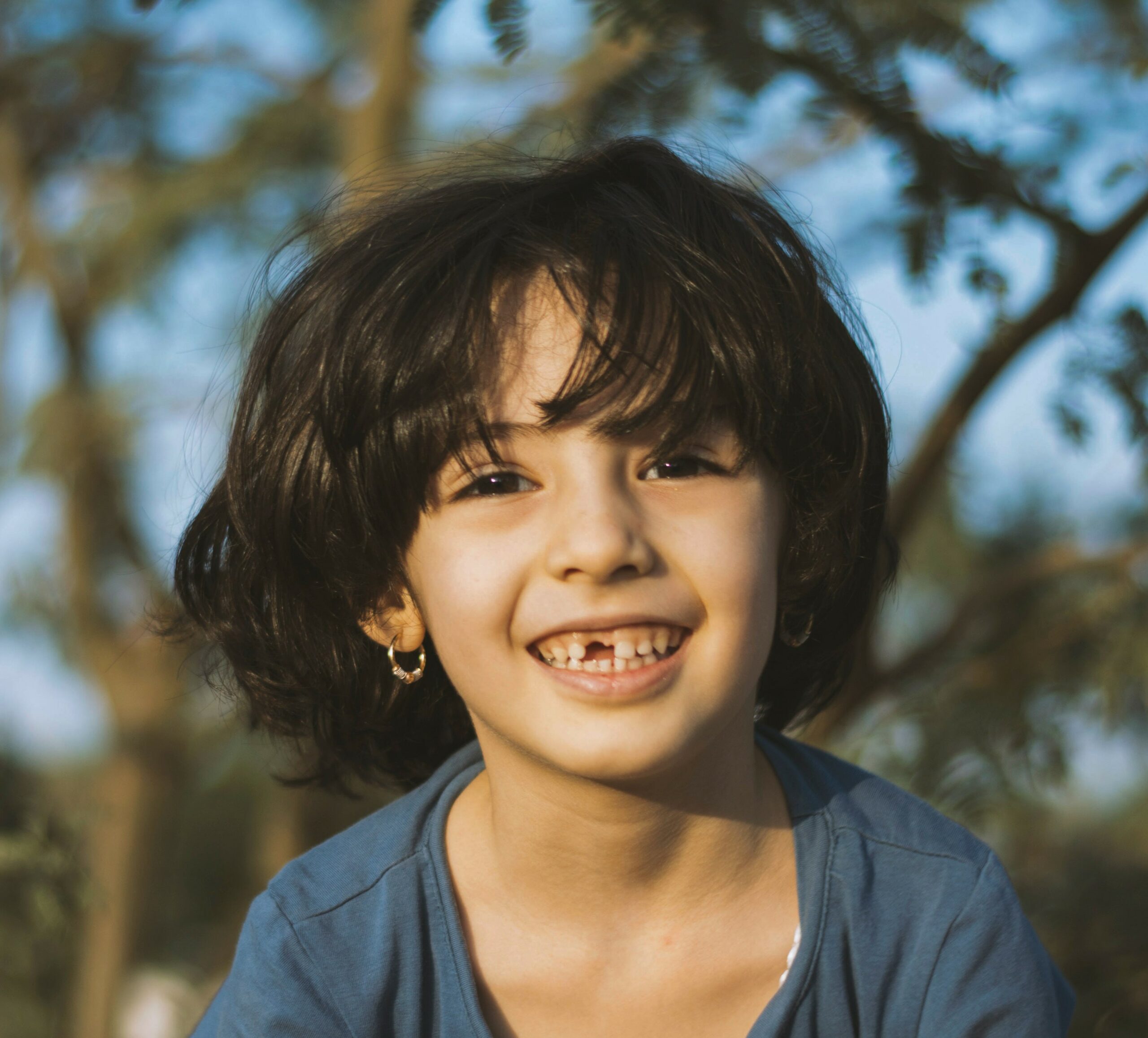 Child with missing tooth