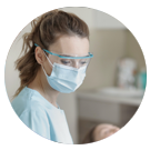 Photo of dental expert wearing a mask